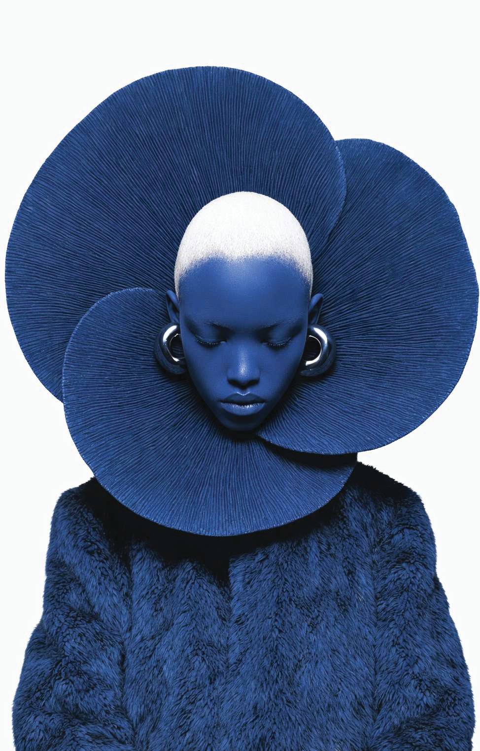Portrait of a woman in sculptural blue, the O'Gali cover image